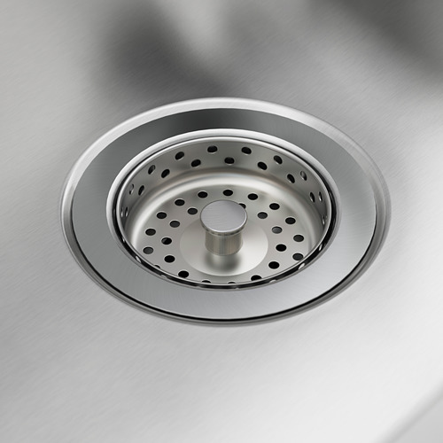 Desagüe de fregadero de acero inoxidable con colador, elegante y funcional, garantiza durabilidad y fácil limpieza.