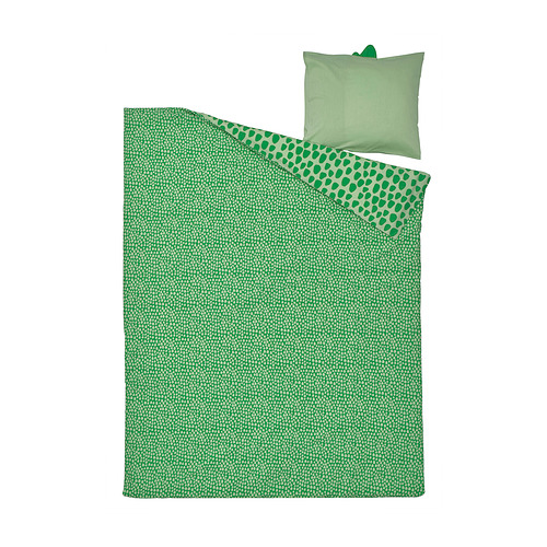 Juego de cama verde con temática de dinosaurios y almohada a juego. Suave mezcla de algodón y viscosa con divertidos estampados.