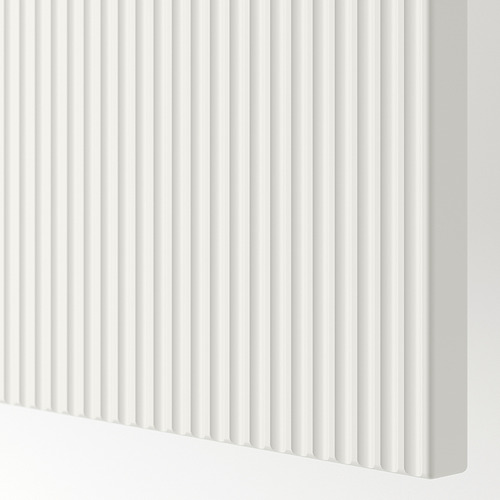 Primer plano del frente del cajón FÖRVALTARE blanco con un diseño estriado elegante y espaciado uniformemente, acabado liso.