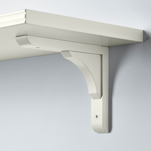 Estante de pared blanco con soporte redondeado, fijado a la pared gris claro, con un diseño minimalista.