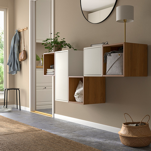 Modern entryway with wall-mounted EKET storage in beige & wood, mirror & lamp.