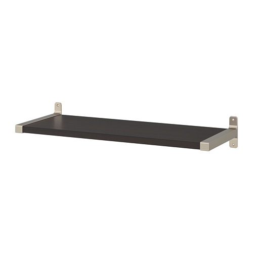 A BERGSHULT wall shelf, black, supported by nickel-plated aluminum brackets. It has a sleek, rectangular design with one beveled edge.
