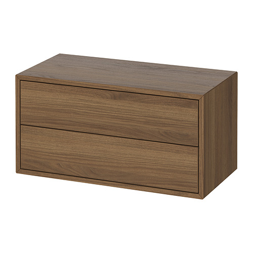 Un armario de almacenamiento EKET, de color marrón claro, rectangular, con un diseño elegante y dos cajones.
