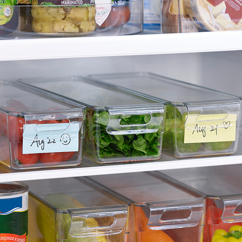 Las cajas organizadoras del refrigerador con tapa almacenan verduras, etiquetadas para fechas, apilables.