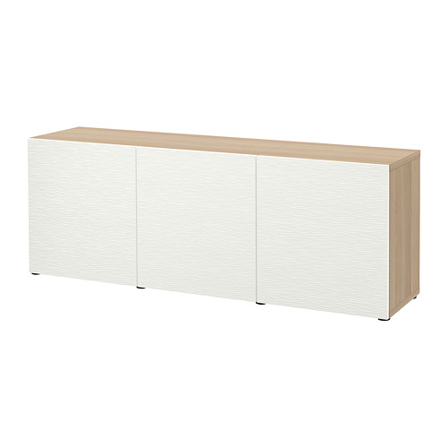Aparador de almacenaje blanco BESTÅ con tapa de madera, tres puertas, estantes ajustables.