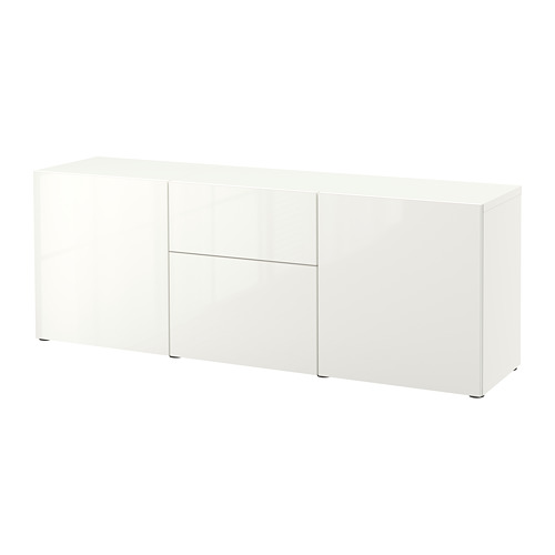 Aparador blanco BESTÅ con diseño minimalista, superficies elegantes y estantes ajustables para un almacenamiento versátil.