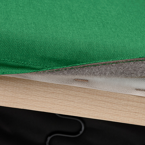 Funda de sofá verde con fijación de velcro en estructura de madera.