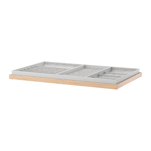 KOMPLEMENT: bandeja de madera ligera con compartimentos grises para accesorios.