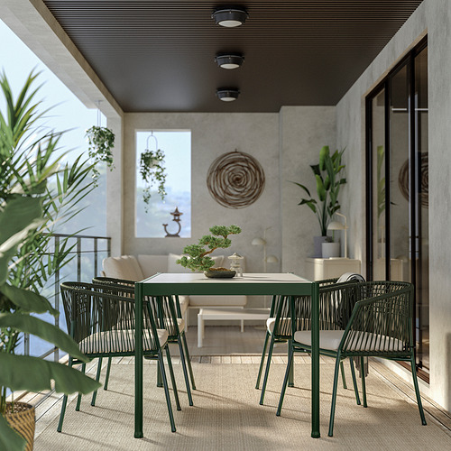 Moderno juego de comedor al aire libre con mesa y sillas de metal con recubrimiento de polvo verde, perfecto para balcones.