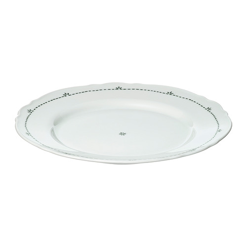 Un plato UPPLAGA blanco con un suave borde ondulado y un borde floral negro. Fabricado en porcelana, es un diseño rural.
