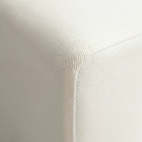 Textura en primer plano de un material blanco de sofá de alta calidad, liso y liso.