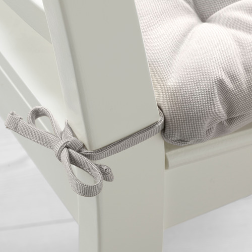 Almohadilla de silla acolchada gris con lazos para un ajuste seguro.