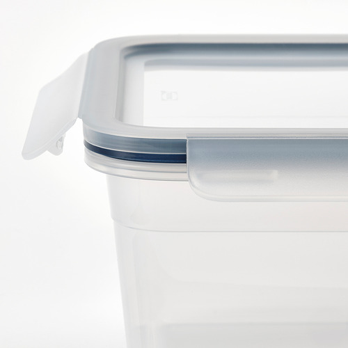 Recipiente de plástico transparente para alimentos con tapa a presión, diseñado para apilar y almacenar a prueba de fugas.
