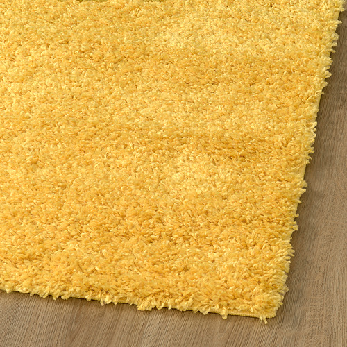Alfombra de área amarilla brillante, suave, peluda, de pelo grueso, se siente acogedora y cálida, ideal para sala de estar o dormitorio.