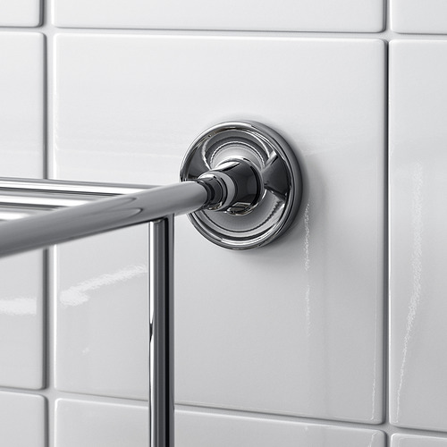 Toallero en pared alicatada con tornillos.