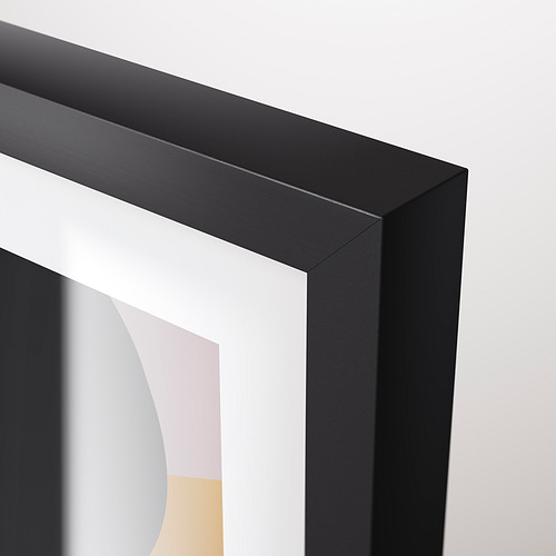 Marco de fotos negro con diseño moderno y bordes claros. Sostiene un colorido estampado abstracto. Herrajes de montaje incluidos.
