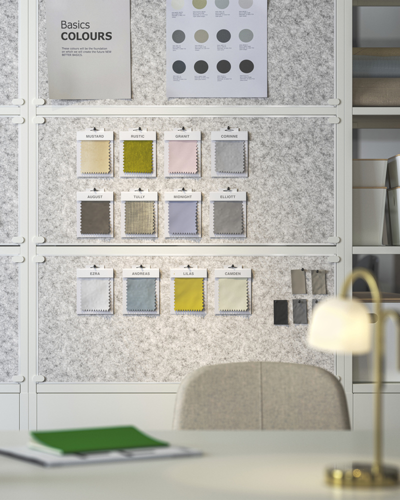 Three white TROTTEN noticeboards doubling as dividers. A desk with a beige LÅNGFJÄLL conference chair sits in the front.