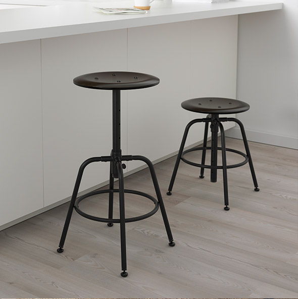 2 DALFRED stools with white kitchen cabinets behind.