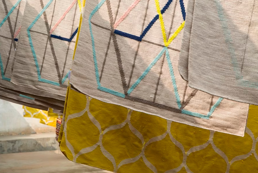 Colorful carpets hung on strings