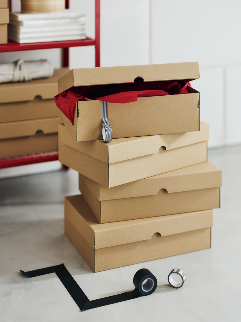 Boxes with lids, earth-colored, with adhesive tapes, black color