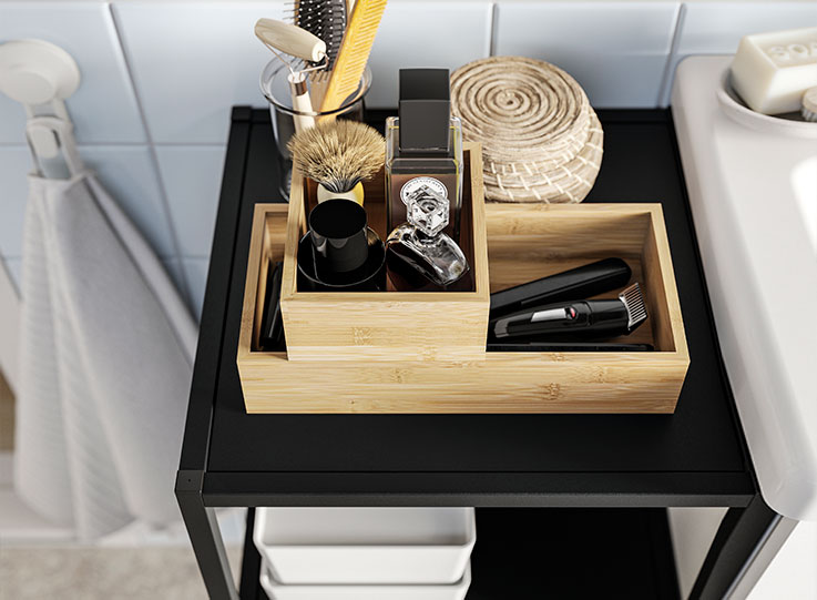 ENHET base shelf with TAVELÅN organizer, TISKEN towel holder, and FREDRIKSJÖN hand towel.
