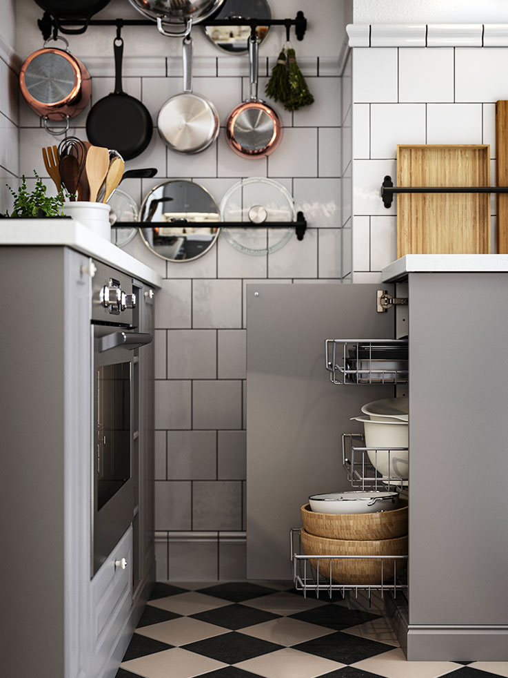 FORNEBY air oven in front of METOD kitchen cabinet and HULTARP rail in the background