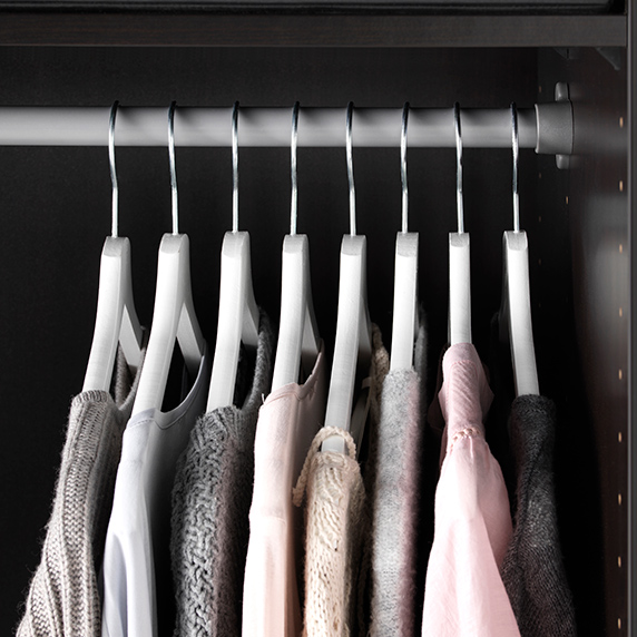 Several garments on BUMERANG hangers.