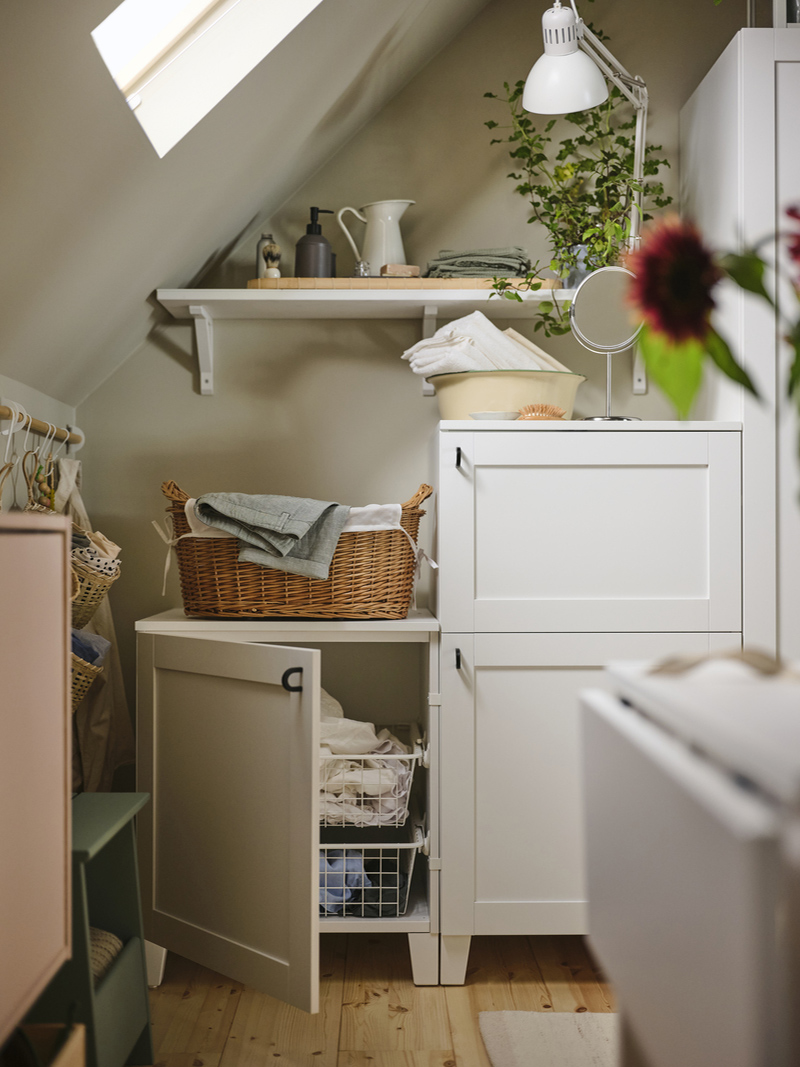 A mix of shelving and a low PLATSA cupboard helps to fill  the space with lots of useful storage