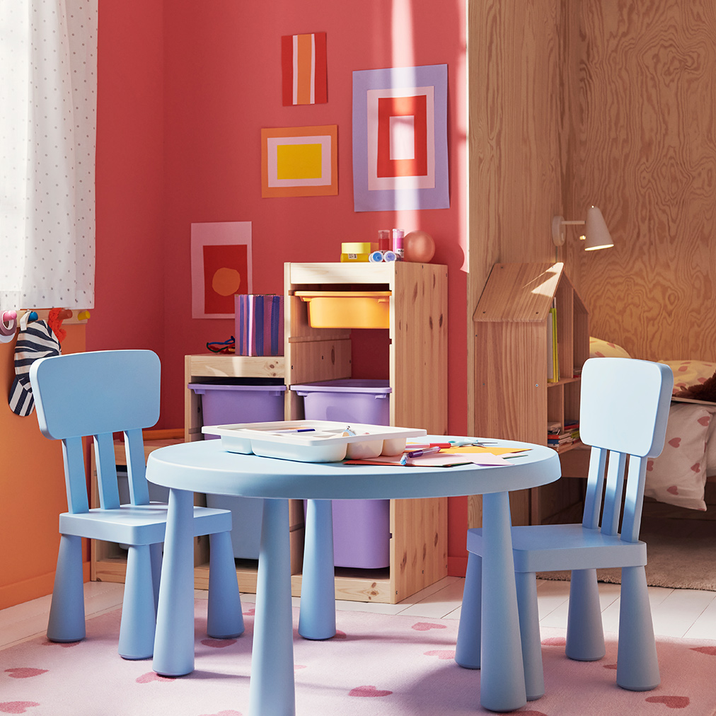   A set of MAMMUT children's chairs and table with several TROFAST storage boxe