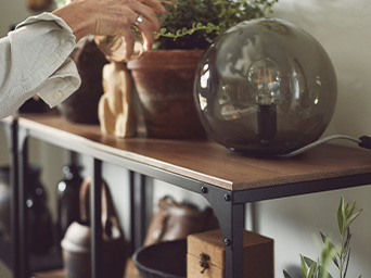Shelf unit with doors and crystal ball lamp