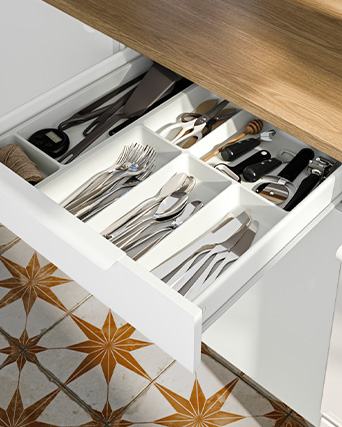 Base cabinet with drawers and flatware set