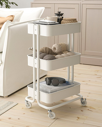 White utility kitchen cart with rounded edges.