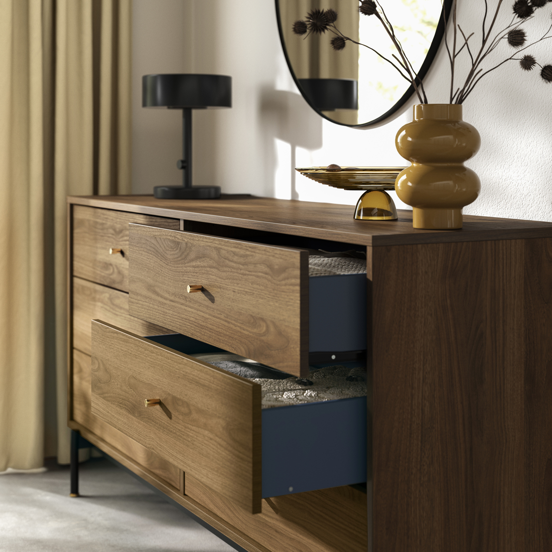 Modern chest with several drawers and a mirror, designed for an elegant and functional storage in the bedroom. 