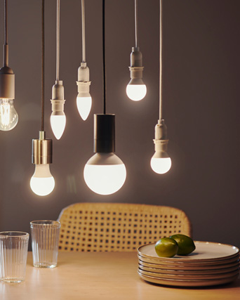 seven light bulbs hanging from the ceiling