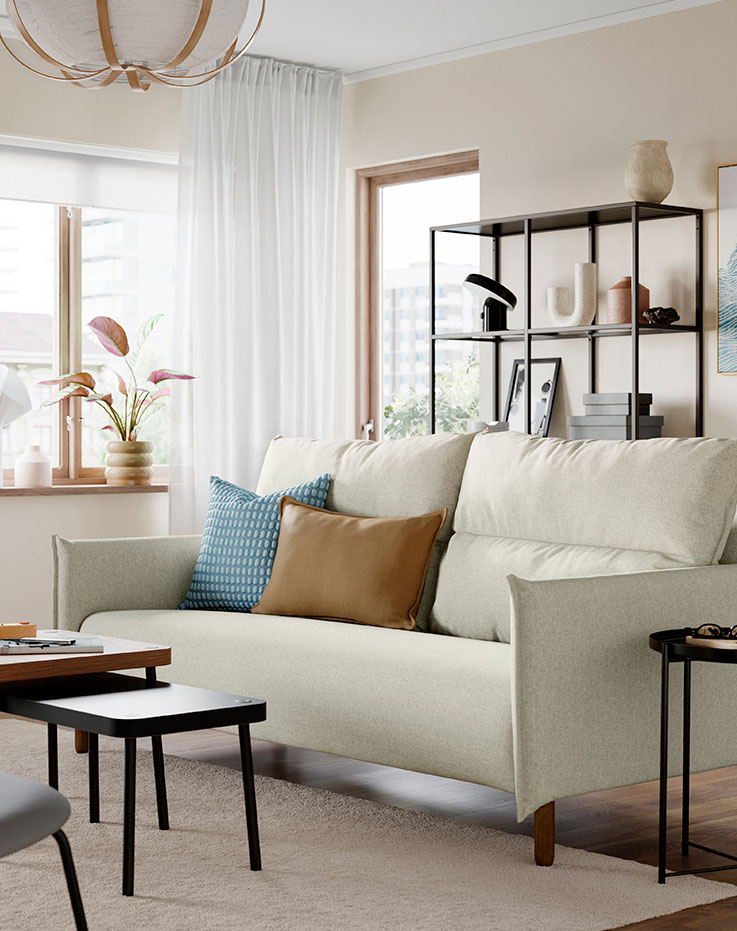 Respaldar y patas de mueble negro sobre alfombre