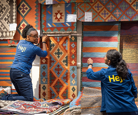 Two IKEA empoyees decorating a set