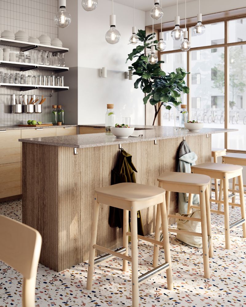 Modern restaurant bar with RÖNNINGE bar stools, KUNGSFORS shelving, SUNNEBY pendant lights and IKEA 365+ tableware.