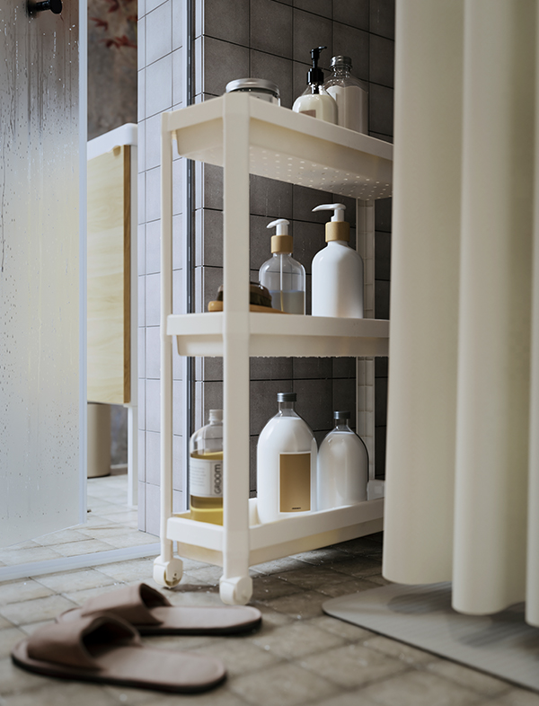 White three-tier VESKEN trolley with wheels for bathroom organization and storage. Ideal for keeping lotions, toiletries, and personal care products neatly organized while maximizing limited space.