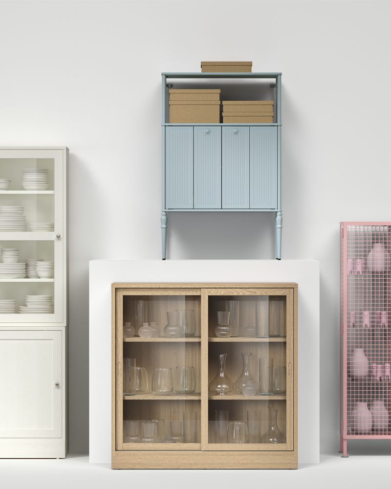 An artful arrangement of HAVSTA, SÅGMÄSTARE, TONSTAD and IKEA PS cabinets, placed side by side against a white wall.