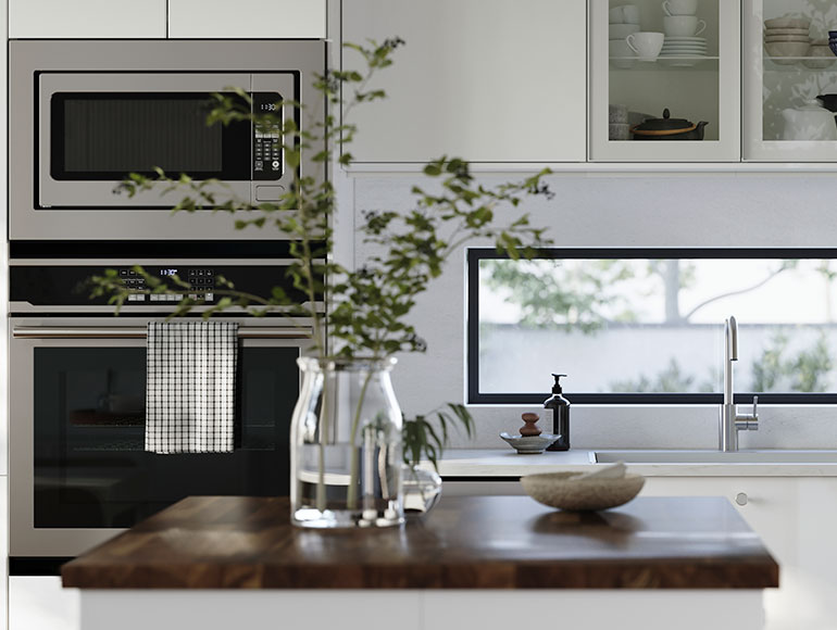 High gloss white kitchen cabinets with lots of storage